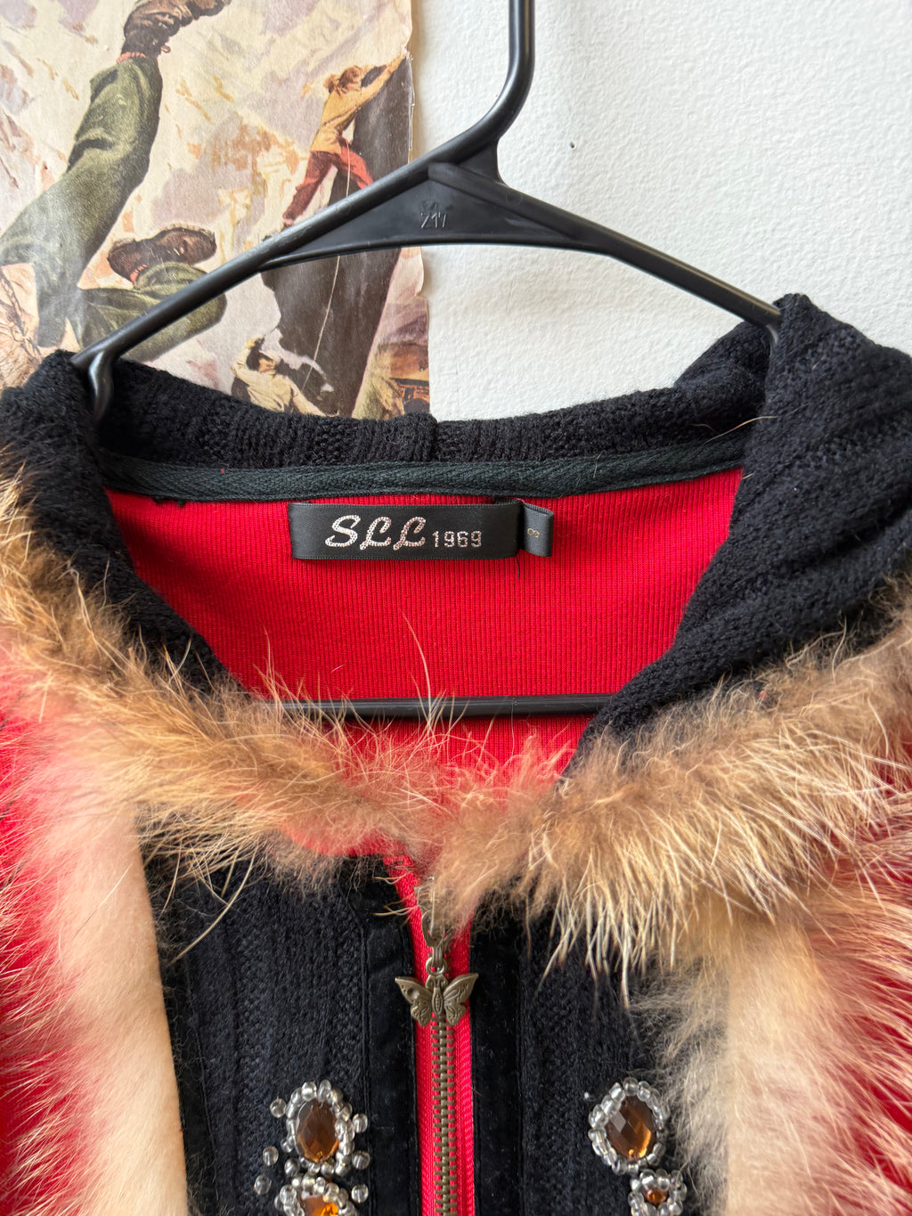 red zip up with fur