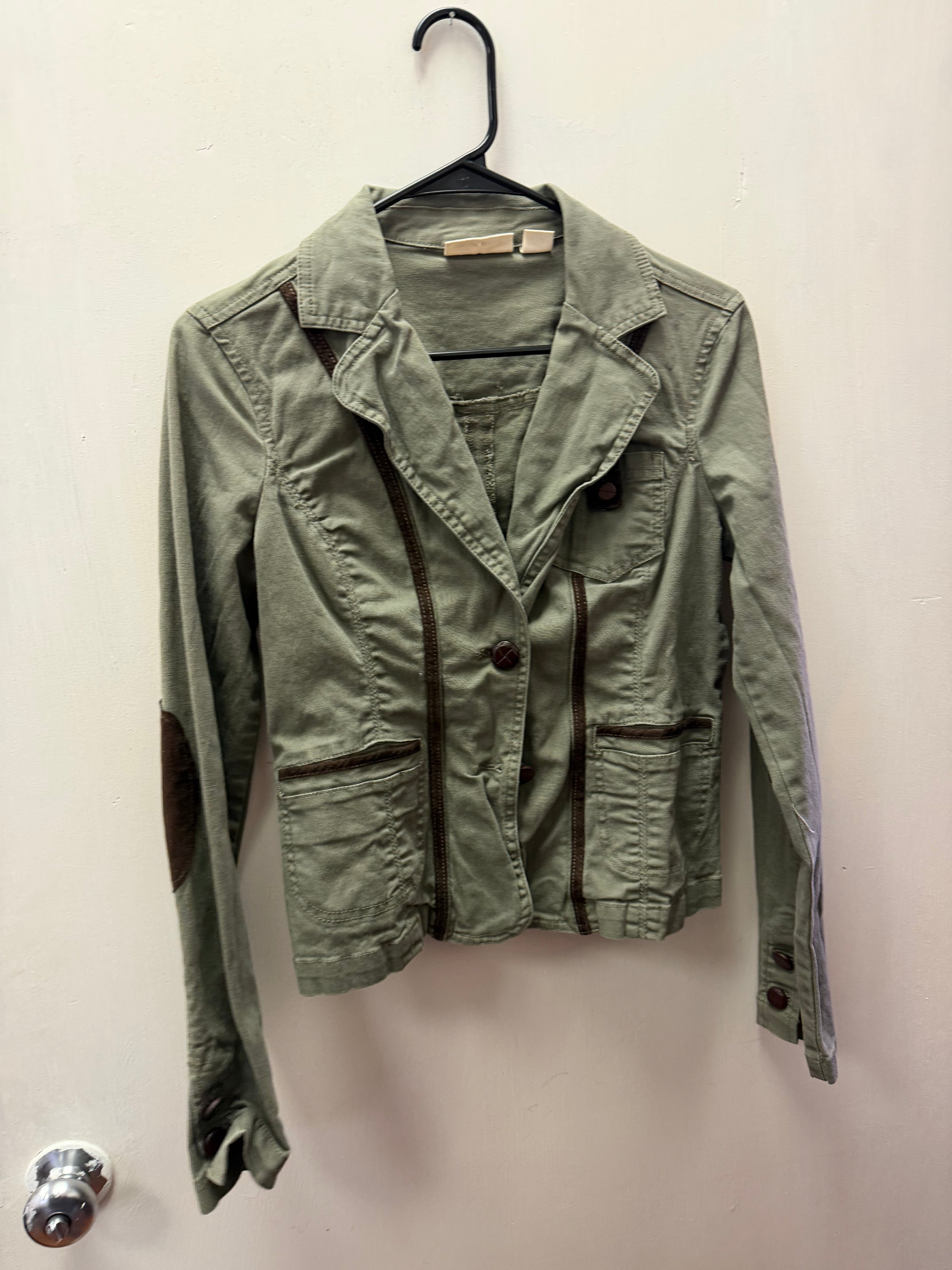 green elbow patch jacket